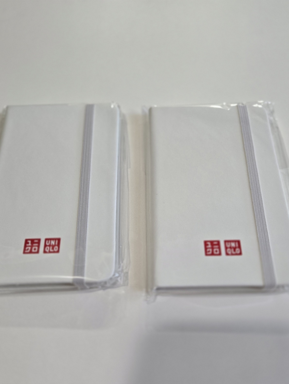 Uniqlo White Elastic-Band Pocket Notebook (Set of 2)